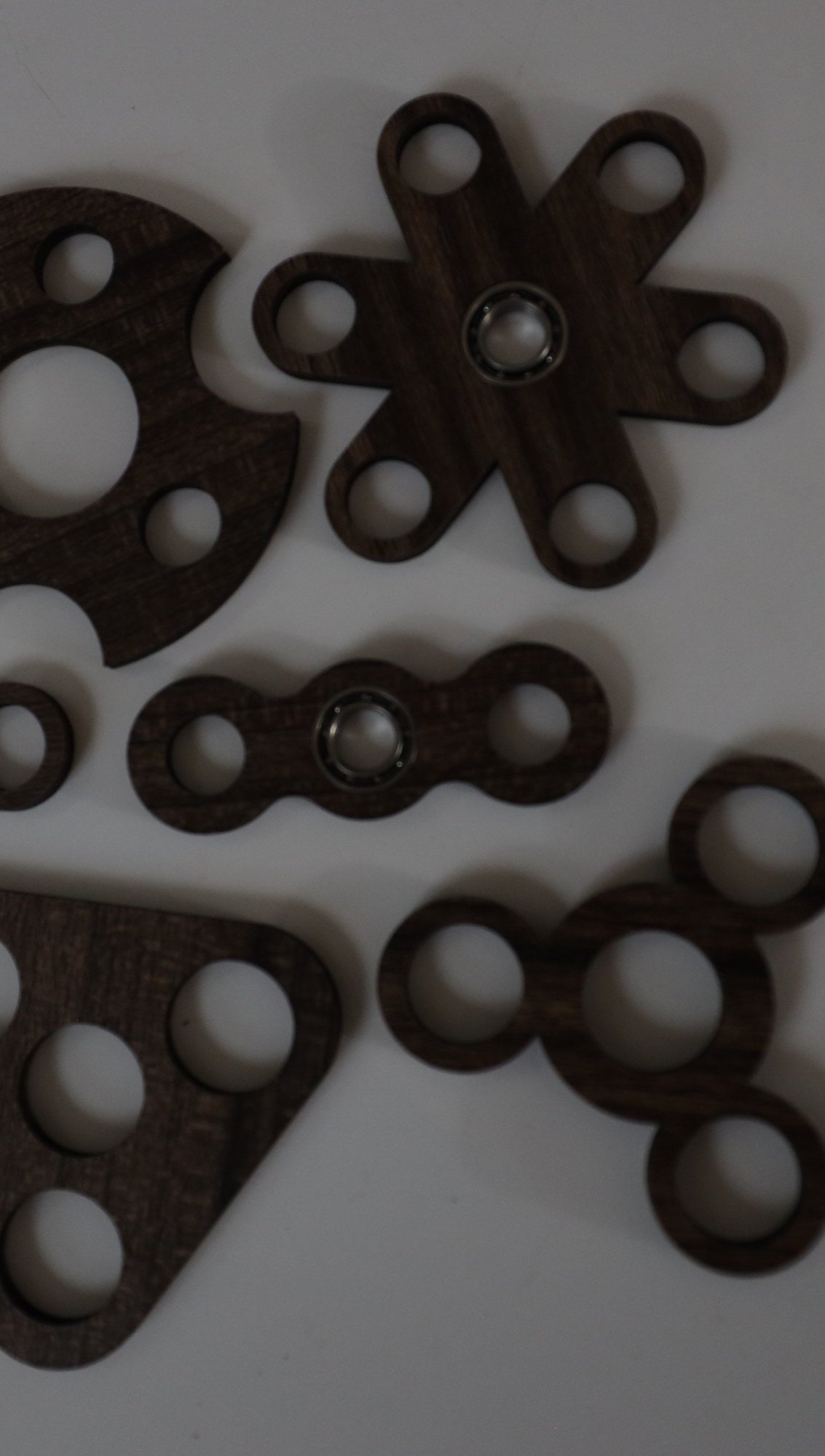 5 mm wooden fidget spinners laid out