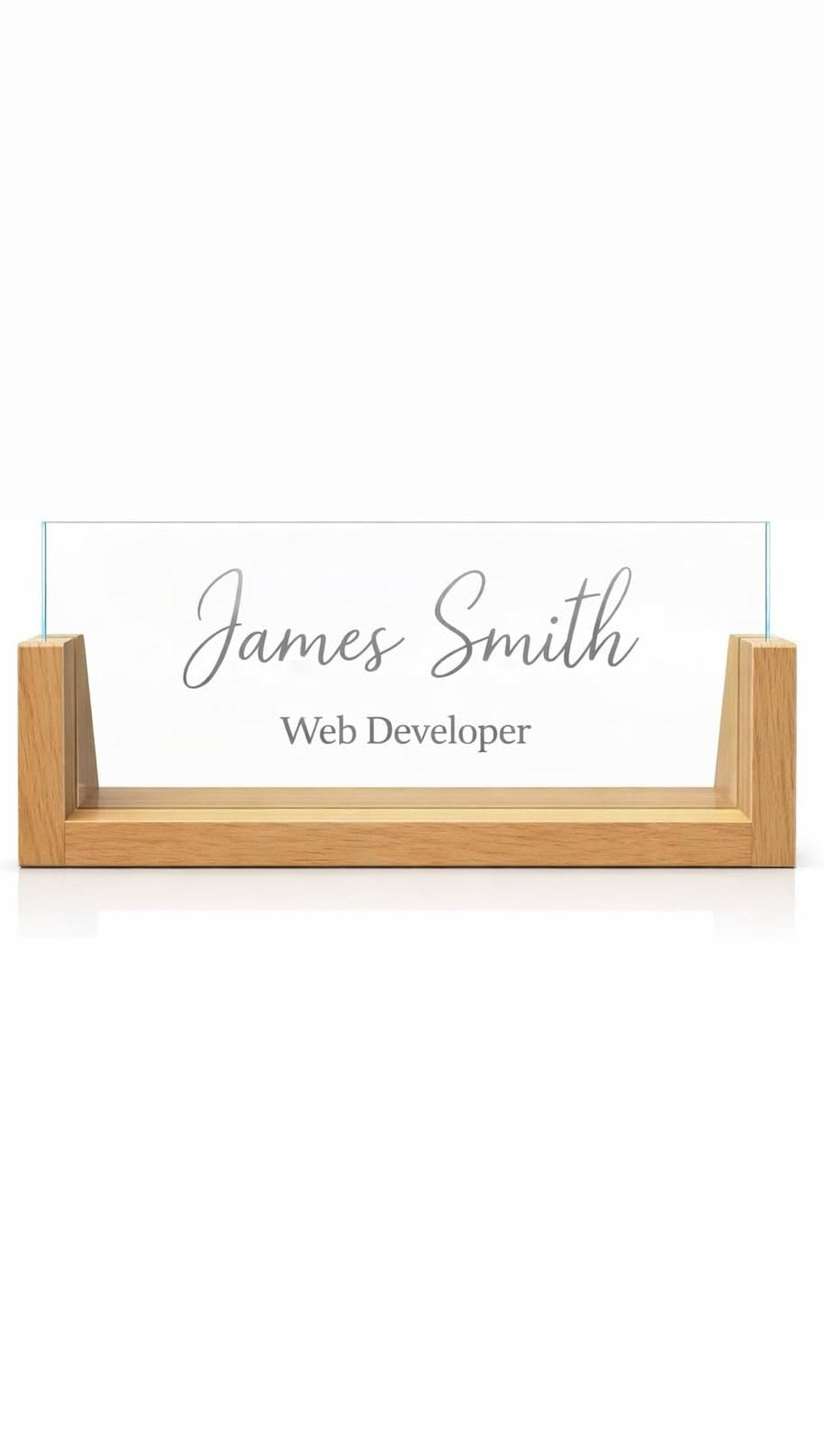 Sample design: clear acrylic desk nameplate in a wooden U-shaped base, engraved with the name James Smith and the title Web Developer