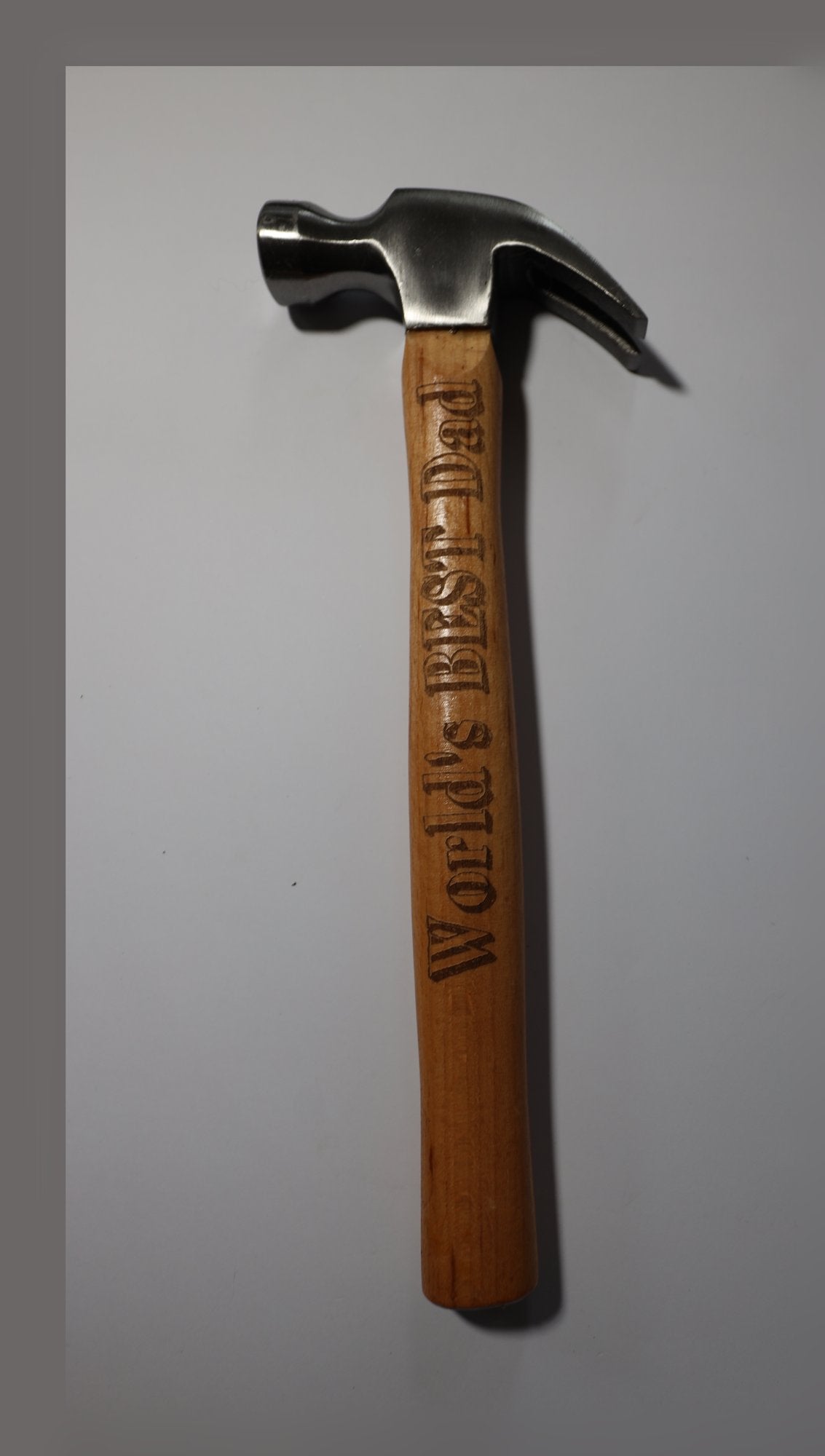 Claw hammer alone with sample World's Best Dad engraving on the handle
