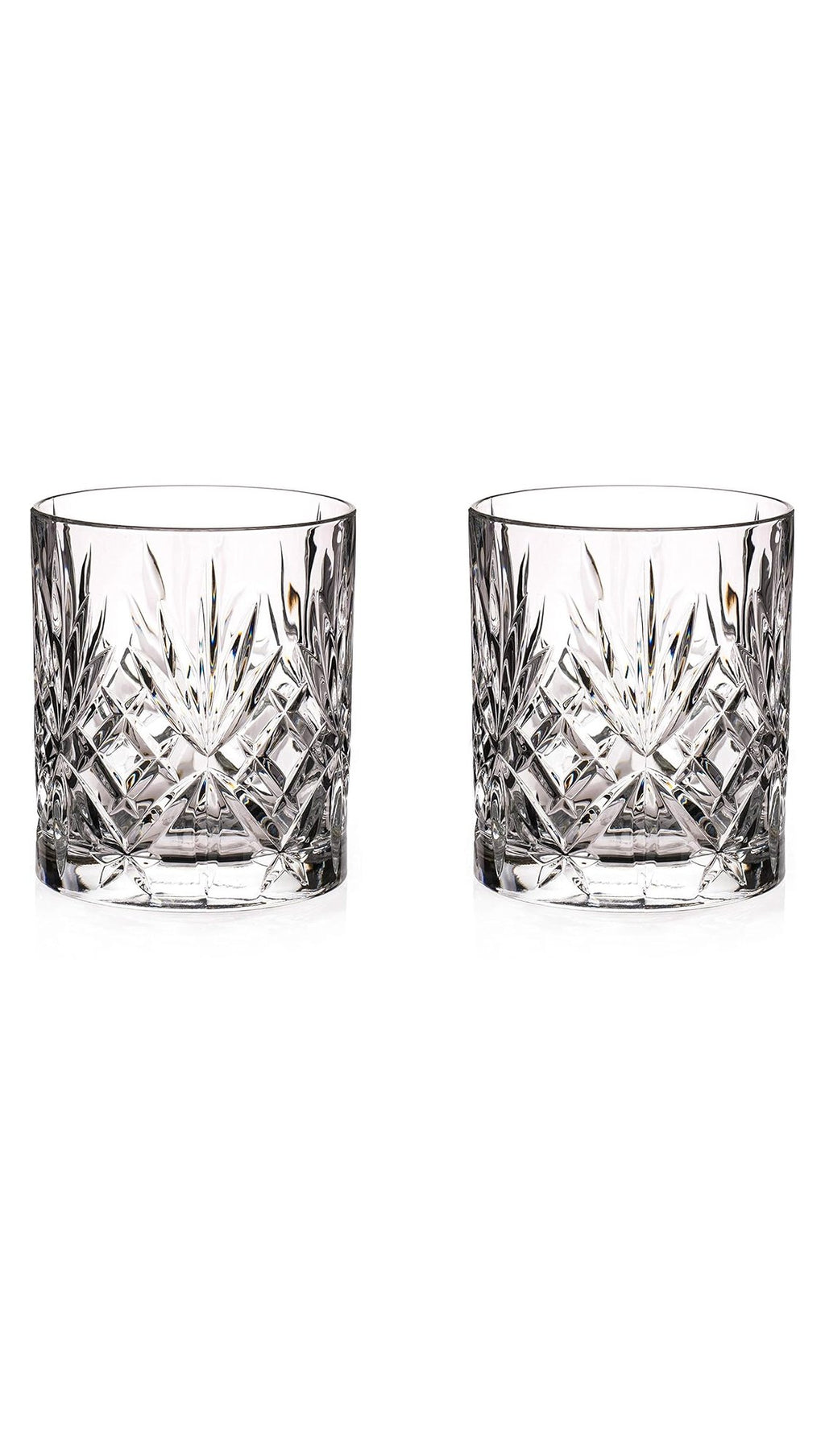 Pair of empty lead-free crystal whiskey tumblers with deep-cut leaf and diamond pattern, before engraving