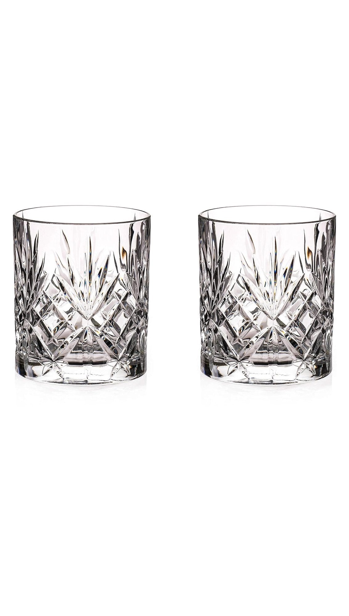 Pair of empty lead-free crystal whiskey tumblers with deep-cut leaf and diamond pattern, before engraving