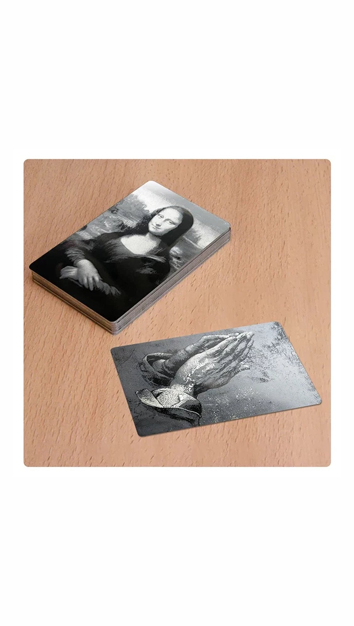 Engraved glossy aluminium business cards with detailed sample artwork