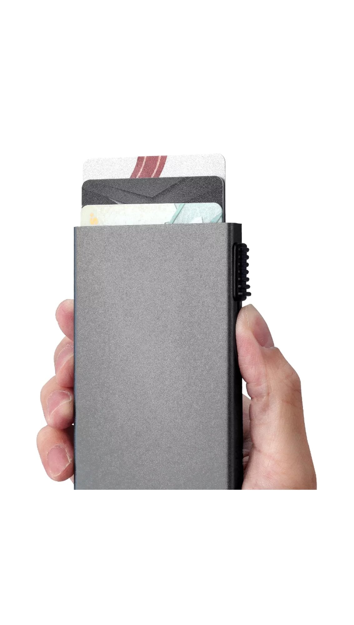 Pop-up metal card holder held in hand, blank before engraving