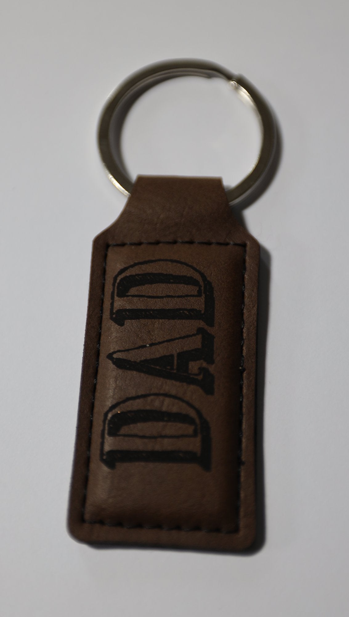 Brown rectangle faux leather keyring engraved DAD, sample only