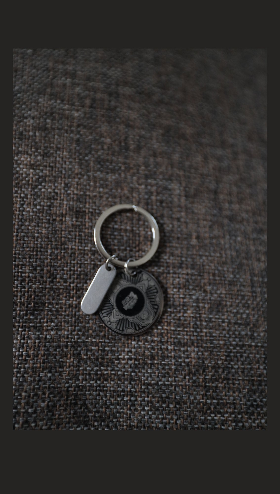 Stainless steel disc keyring with sample engraving, alternative fabric view