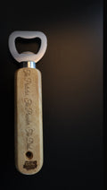 Wooden handle bottle opener with steel head, engraved sample text, upright on black