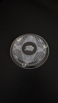 Etched glass coaster with Art Deco design