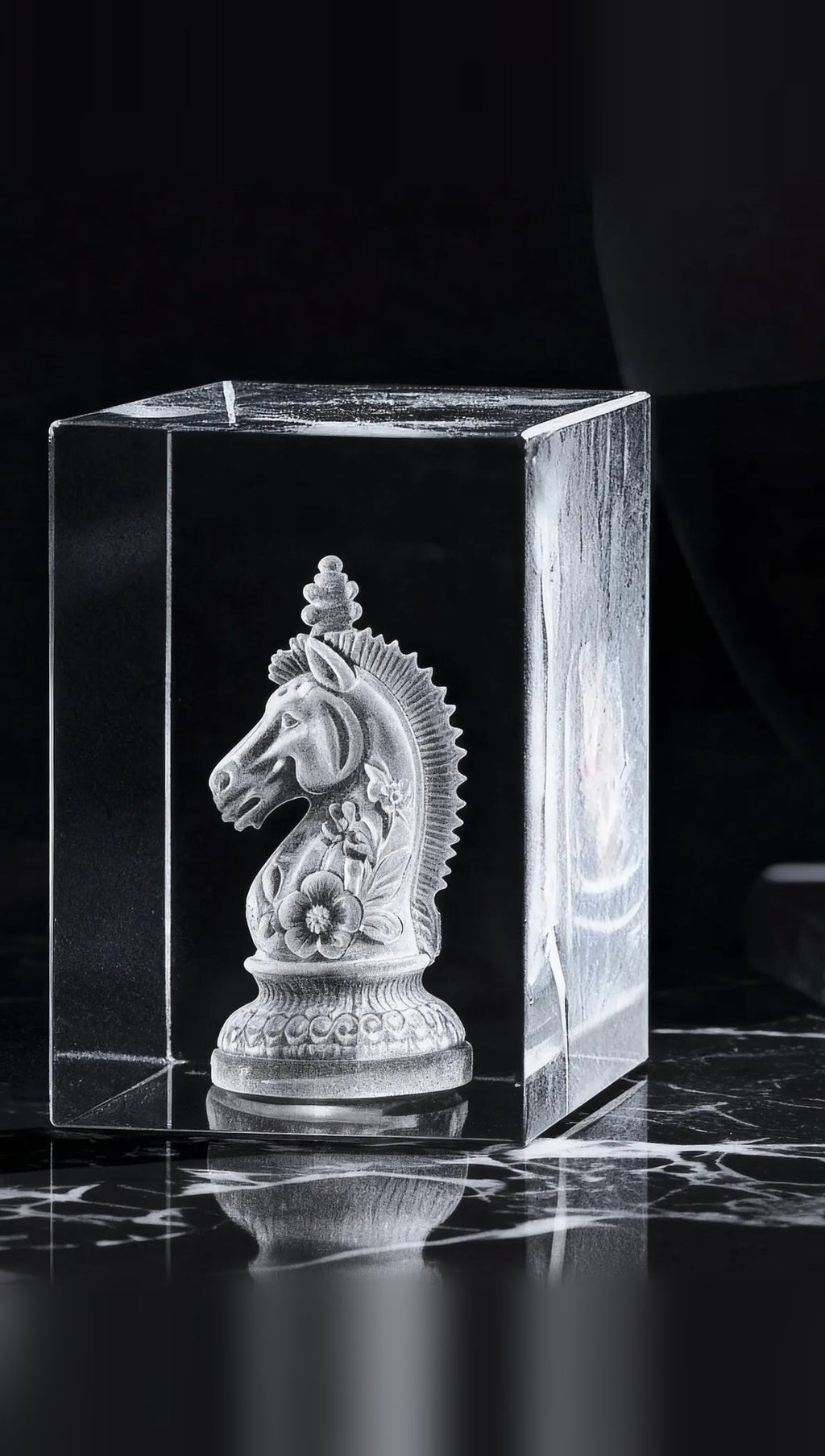 Square crystal tower with a 3D-engraved design, shown without the base