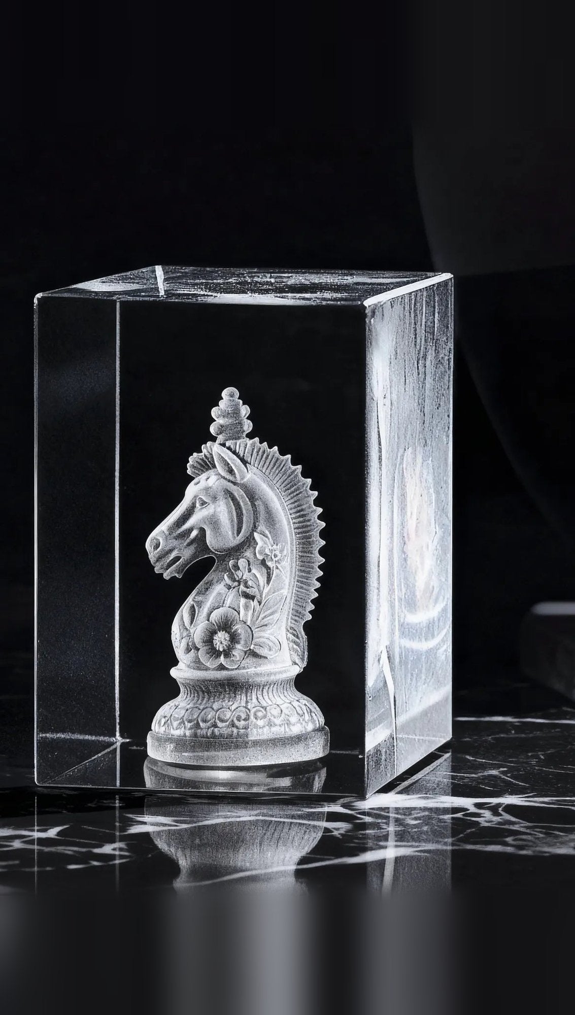 Square crystal tower with a 3D-engraved design, shown without the base